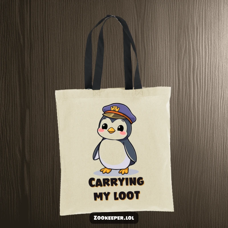 Funny tote bag featuring a mischievous penguin waddling with a zookeeper's forgotten hat, perfect for carrying essentials with a zoo flair.